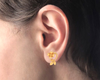 14K dainty gold earrings with fine leafy and floral patterns