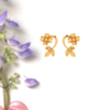 14K dainty gold earrings with fine leafy and floral patterns