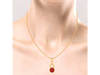 14K sleek gold pendant with a beautiful red stone 