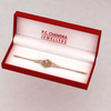 14K Gold Bracelet Including Multiple Flowers with Pink Pearl 