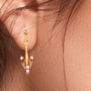 14K intricate gold earrings with unique design