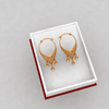 14K beautiful gold earrings with detailed craftsmanship