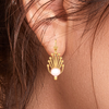 14K gold earrings with very distinct design and a spherical bead in between