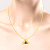 14K gold pendant in the shape of a cone with a red stone in the centre