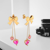 14K Gold Ribbon bow and dangling Pink Hearts Earings