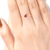 14K gold ring with a rose motif adorned with red stones