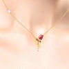 14K gold necklace with a rose flower design and a pearl accent 