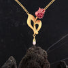 14K gold necklace with a rose flower design and a pearl accent 