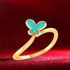 14K gold ring with a butterfly on top  