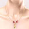 14K gold necklace with stone-studded double tulips and a heart drop 