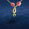 14K gold necklace with stone-studded double tulips and a heart drop 