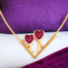 14K Gold Necklace With Walking Hearts Design Set On A V Shape In The Centre