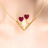 14K Gold Necklace With Walking Hearts Design Set On A V Shape In The Centre