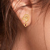 14k (585) Gold Earrings Swirling Design With Heart Shaped Dangles And Embedded Stones