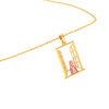 14K gold pendant in the shape of a girl in front of a window from Amazea Collection 