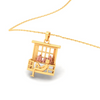 14K gold pendant in the shape of a boy gazing through a window from Amazea Collection 