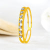 14K Gold Ring With A Double Band Design And A Row Of Diamond Accents Set On The Overlapping Band