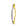 Slender 14K Gold Ring With Sparkling Diamonds Over Continuous Bands