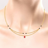 18K Gold Mangalsutra adorned with a red stone from PC Chandra\
 Jewellers' Mangalsutra Collection 