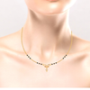 18K A unique shaped Diamond Mangalsutra for women with two red stones from Mangalsutra Collection