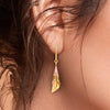 18K gold conical earrings with a hint of rose gold