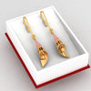 18K gold conical earrings with a hint of rose gold