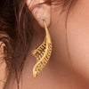 18K earrings made of gold with a distinctive bent conical form