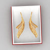 18K earrings made of gold with a distinctive bent conical form