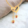 18K Gold Necklace With Heart Shaped Designs And Embedded Stones