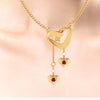 18K Gold Necklace With Heart Shaped Designs And Embedded Stones