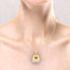 18K book-shaped Gold & Diamond pendant with a love-shaped cutout from Diamond Collection 