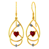 18K Diamond earrings with intricate design and red heart shaped stone