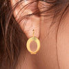 22K gold earrings featuring intricate details and a hint of rose gold