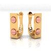 22K rectangular gold earrings featuring two dots of rose gold hue