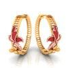 Earrings made of 22K gold featuring a rose gold-colored butterfly perched on a floral motif