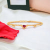 22K (916) Gold Bracelet With Heart Motif Set On A V Shape And Embedded Pearls