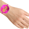 22K gold rakhi with dark pink threads and 'Bhai' written on it from Rakhi Collection