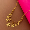 Uniquely Designed 22K Gold Necklace Adorned With Hoops And Floral Details 