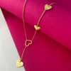 Gleaming 22K gold chain with a small dangler and heart shaped design