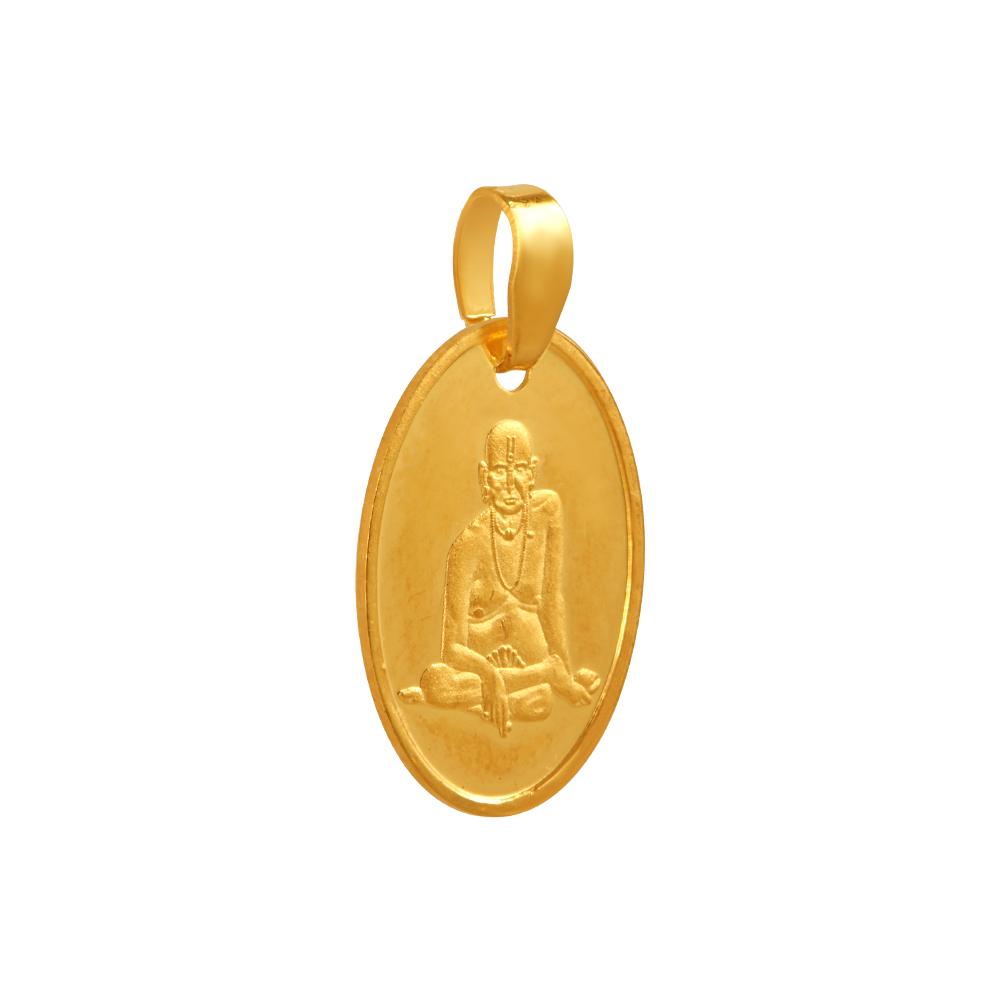 22K gold pendant with an oval shape and the image of an ascetic embedded within